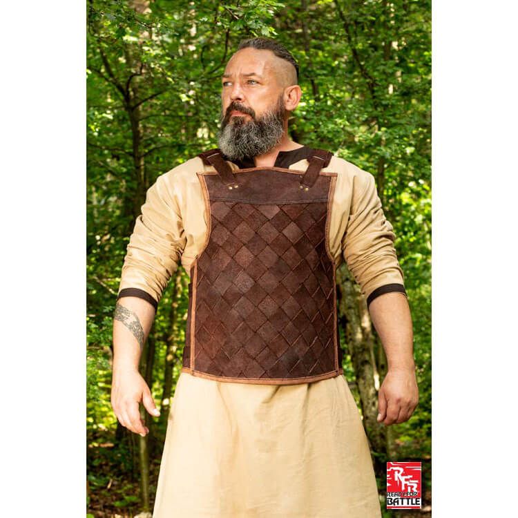 The brown RFB leather armor worn by a Viking man from the front